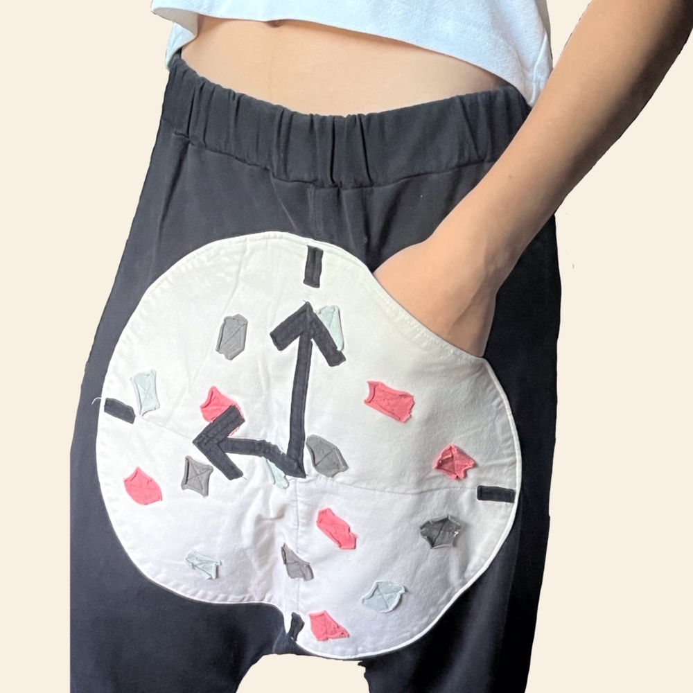 Black clock design drop crotch capri pants